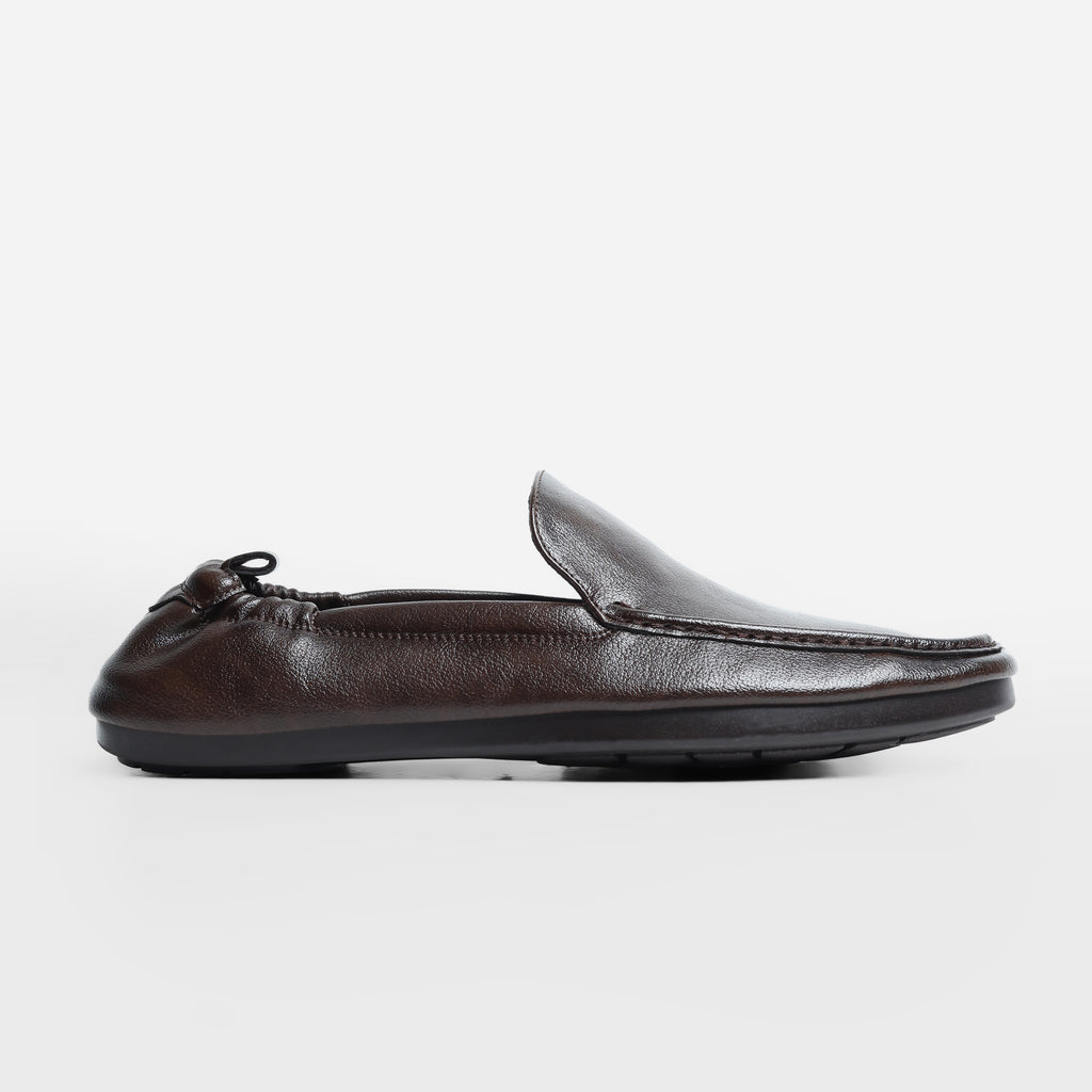 Stratford Driving Loafers in Coffee Brown by Fadano — premium microfiber slip-on shoes for men featuring AeroFlex™ technology, cushioned insoles, and a moc toe design. Ideal for those searching bata shoes for men, almas loafers, or the best loafers for men in Pakistan. Whether you're styling for work, a casual drive, or pairing with shalwar kameez, these branded shoes offer comfort and sophistication. A great pick among best men shoes brands in Pakistan and alternatives to ndure shoes or hush puppies.