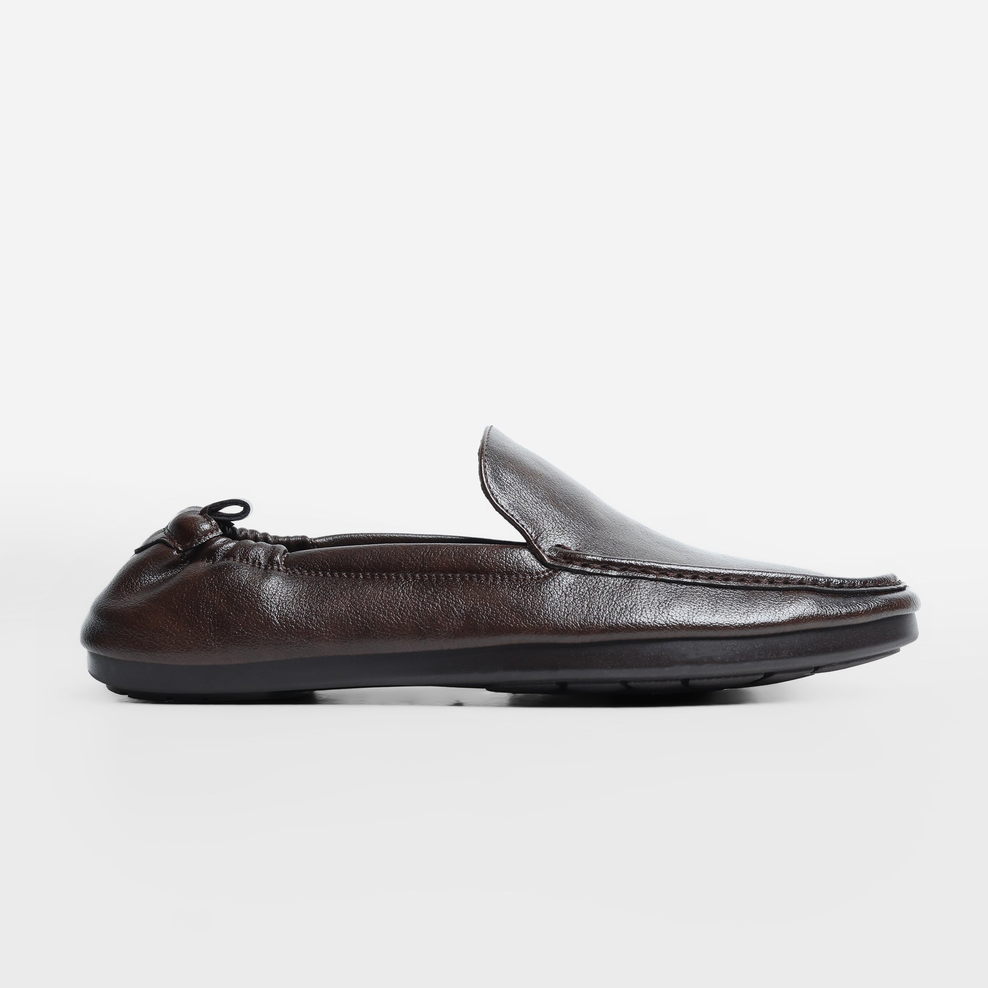 Stratford Driving Loafers in Coffee Brown by Fadano — premium microfiber slip-on shoes for men featuring AeroFlex™ technology, cushioned insoles, and a moc toe design. Ideal for those searching bata shoes for men, almas loafers, or the best loafers for men in Pakistan. Whether you're styling for work, a casual drive, or pairing with shalwar kameez, these branded shoes offer comfort and sophistication. A great pick among best men shoes brands in Pakistan and alternatives to ndure shoes or hush puppies.