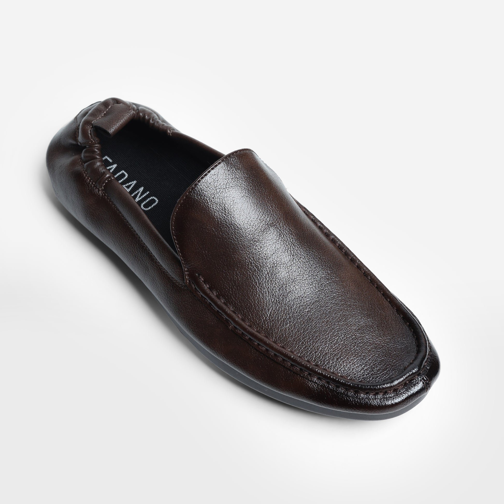 Fadano Stratford Driving Loafers — stylish and comfortable brown slip-on shoes for men, crafted with breathable microfiber leather and lightweight AeroFlex™ sole for everyday versatility. These formal loafers rival bata, almas shoes men, and borjan shoes, while offering the comfort of casual footwear. Ideal for men who value both eastern and western styling, whether you're heading to the office or dressing up for an event in Pakistan.