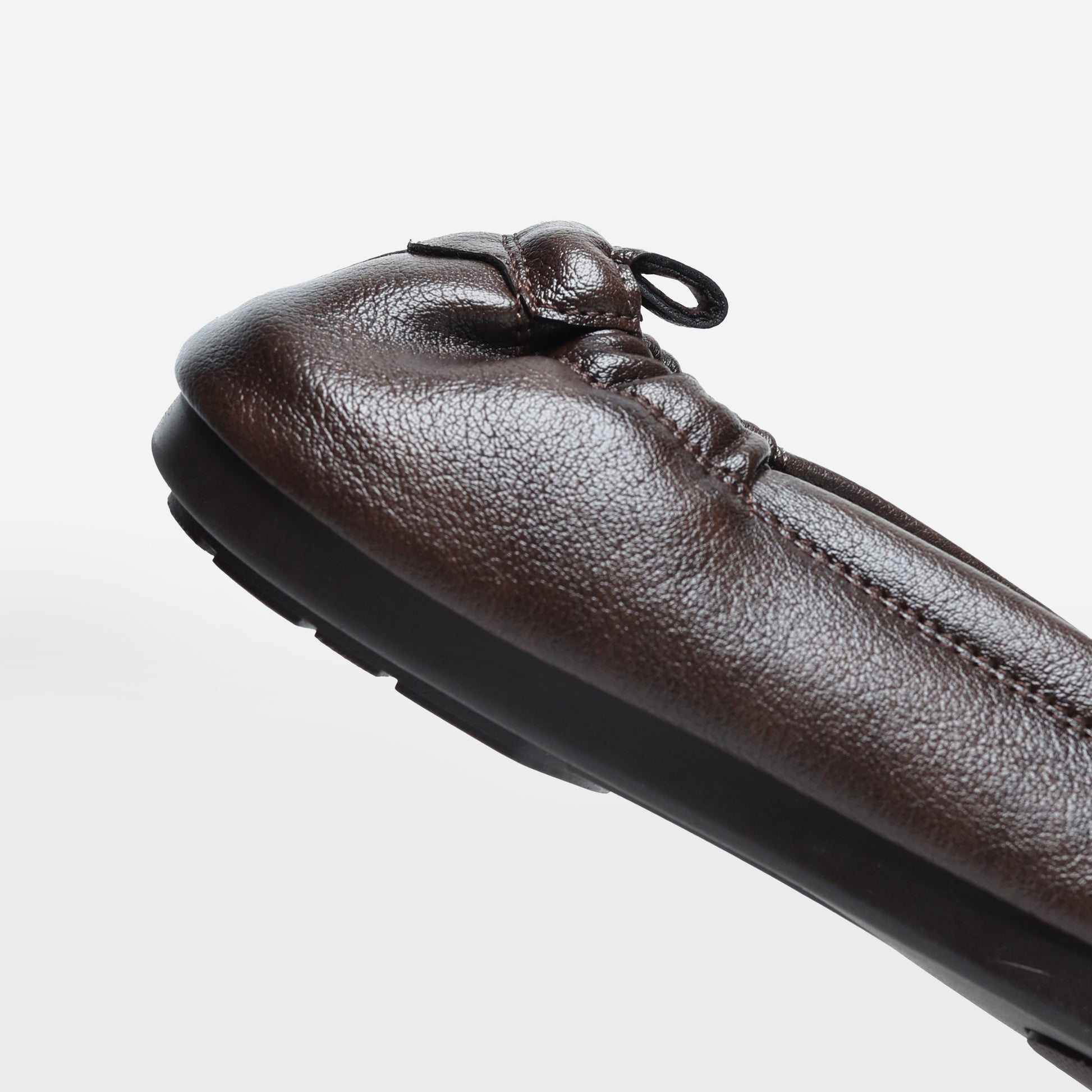 Fadano Stratford Driving Loafers — stylish and comfortable brown slip-on shoes for men, crafted with breathable microfiber leather and lightweight AeroFlex™ sole for everyday versatility. These formal loafers rival bata, almas shoes men, and borjan shoes, while offering the comfort of casual footwear. Ideal for men who value both eastern and western styling, whether you're heading to the office or dressing up for an event in Pakistan.