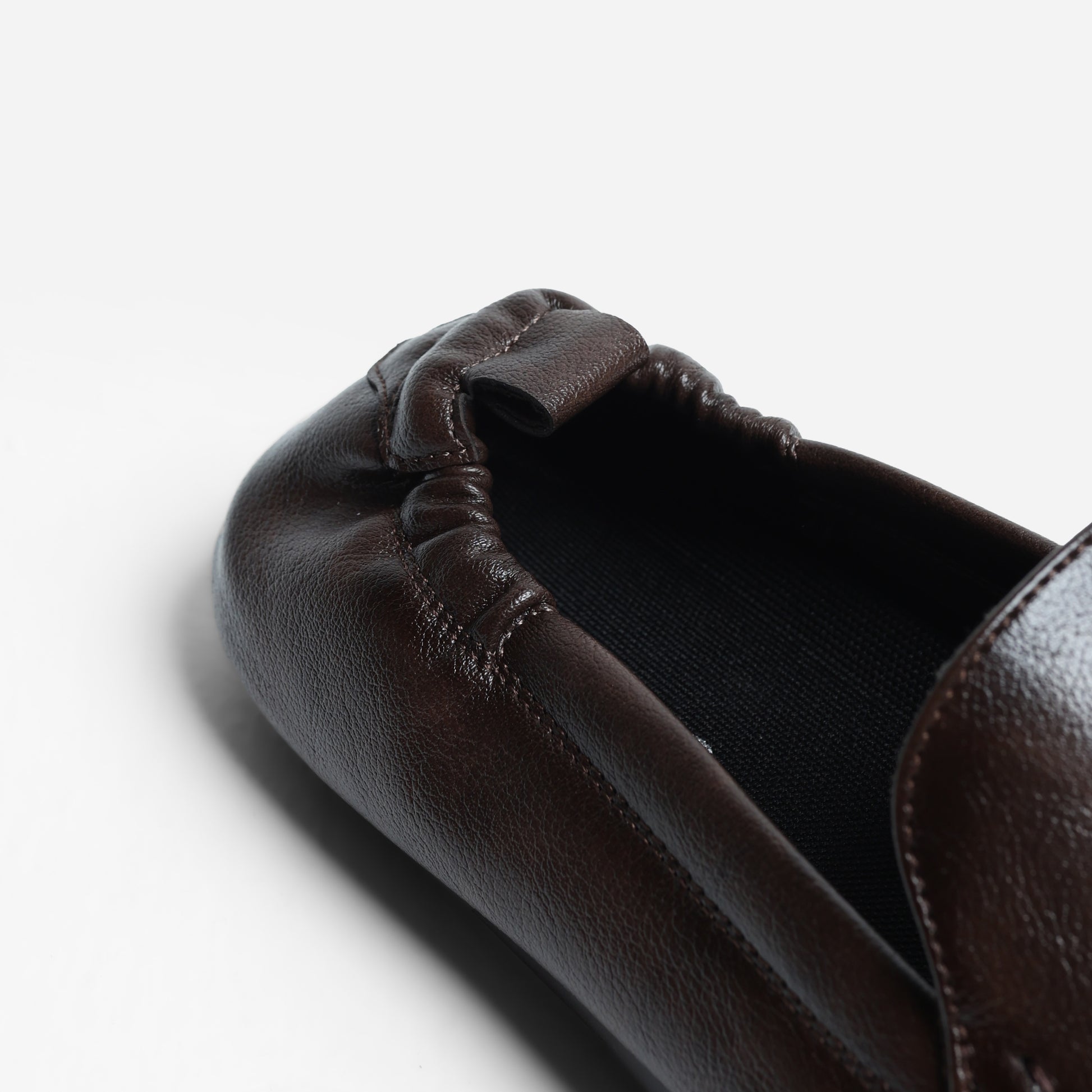 Fadano Stratford Driving Loafers — stylish and comfortable brown slip-on shoes for men, crafted with breathable microfiber leather and lightweight AeroFlex™ sole for everyday versatility. These formal loafers rival bata, almas shoes men, and borjan shoes, while offering the comfort of casual footwear. Ideal for men who value both eastern and western styling, whether you're heading to the office or dressing up for an event in Pakistan.